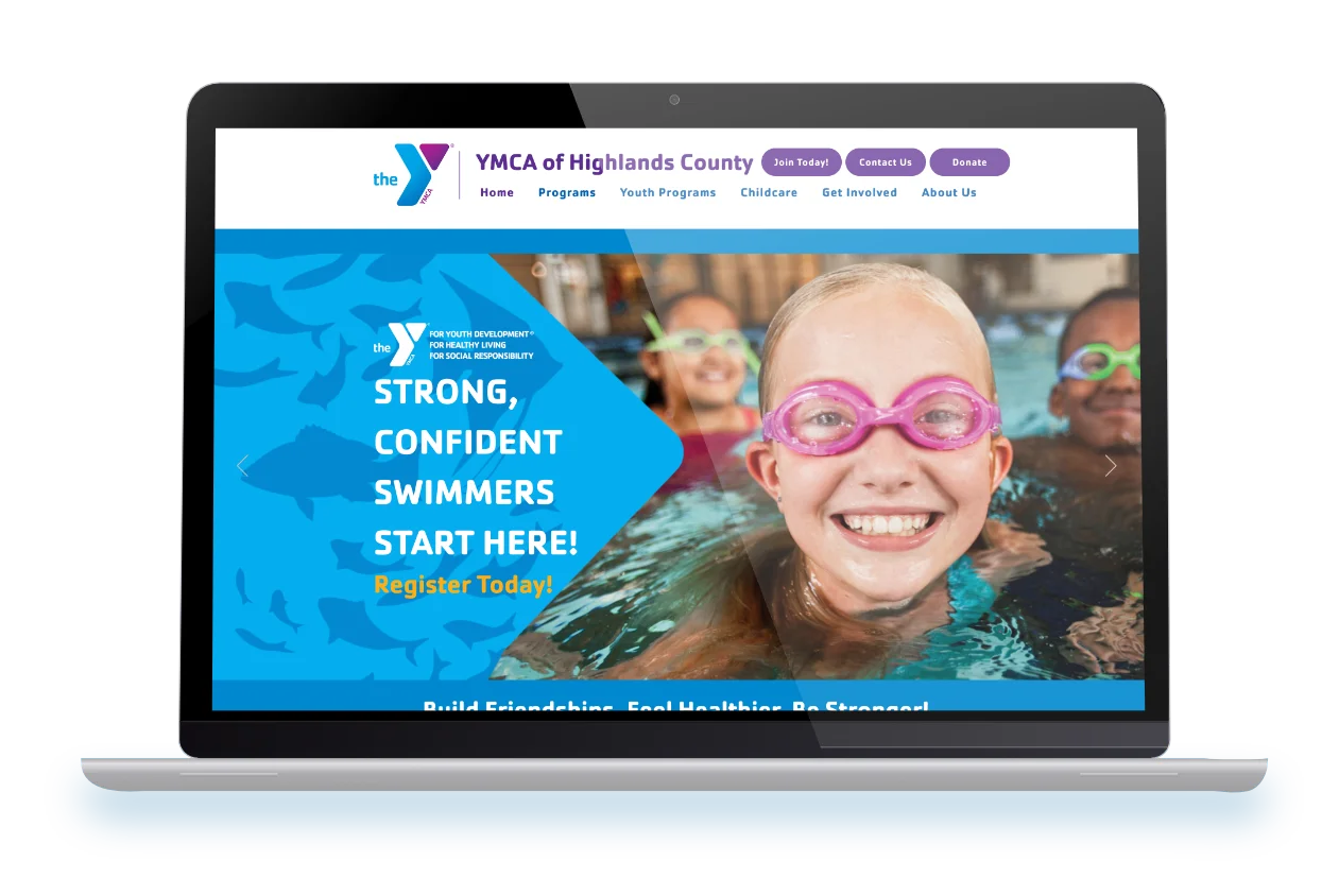 A laptop showing the web design for the YMCA in Florida.